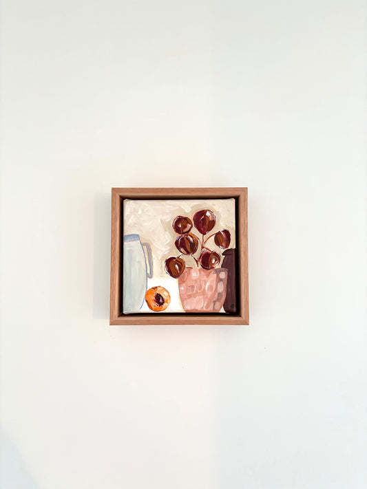 Abstract still life painting with a plant in pink pot, halved peach and a pale blue jug.
