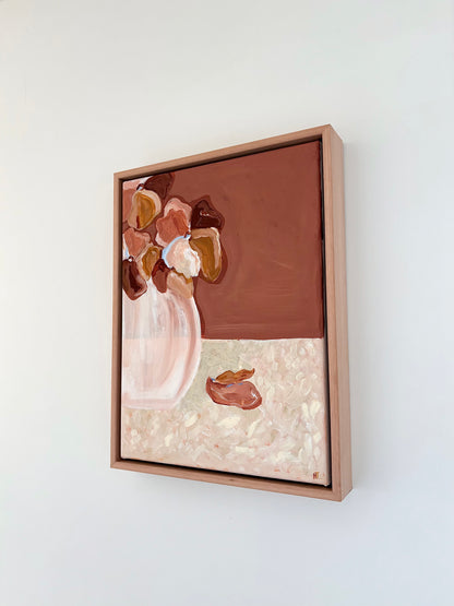 Abstract painting of warm brown and pink flowers in a vase on a brown and cream background. The bottom halve of the background is textured cream colours with two fallen petals. 