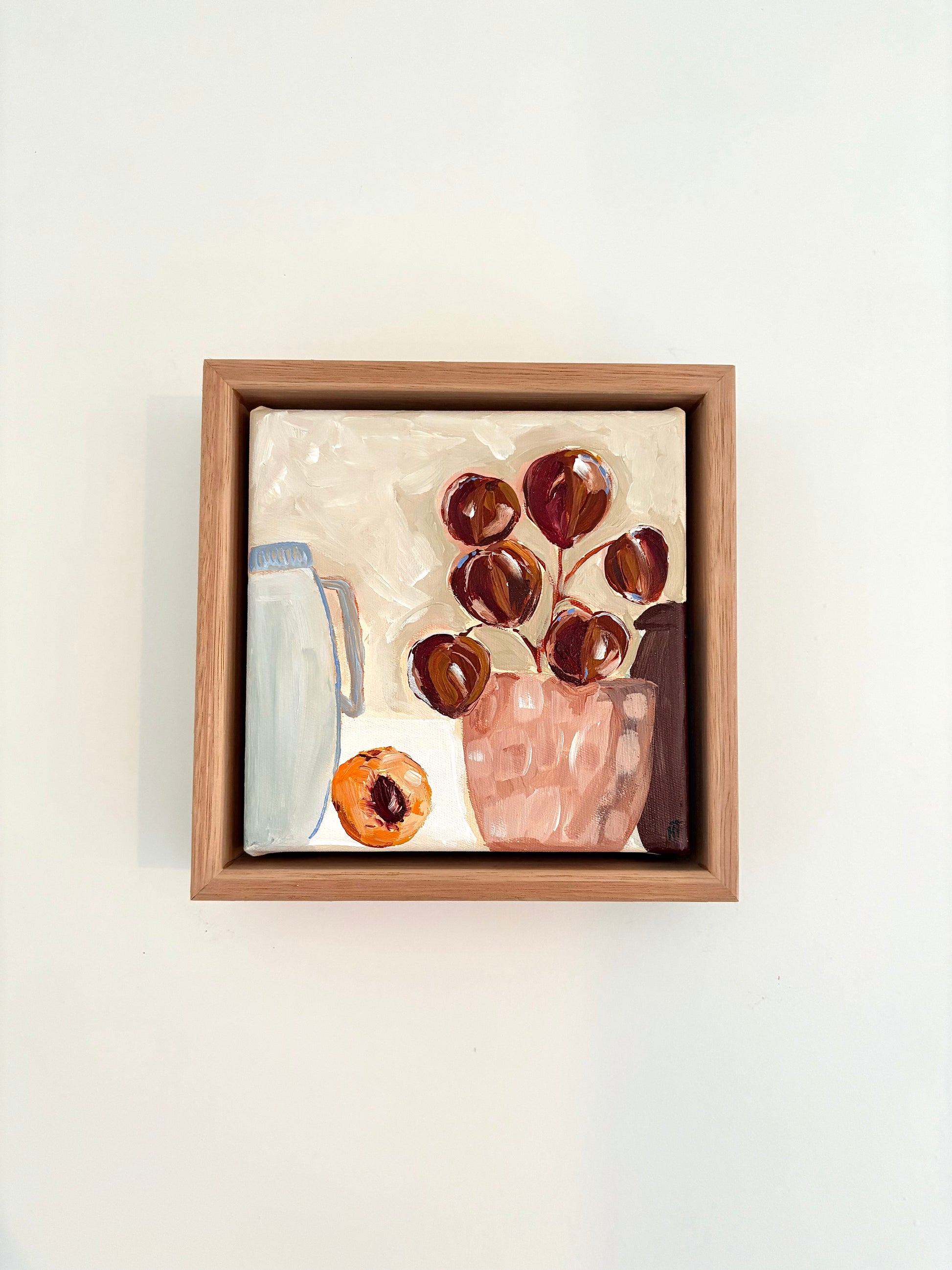 Abstract still life painting with a plant in pink pot, halved peach and a pale blue jug.